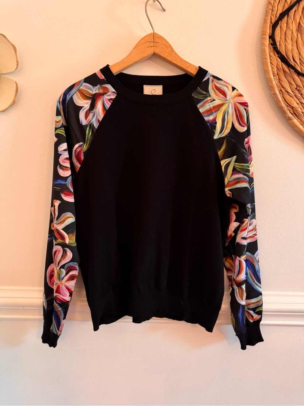 Sioni Black Crewneck Sweater with Multicolor Floral Sleeves